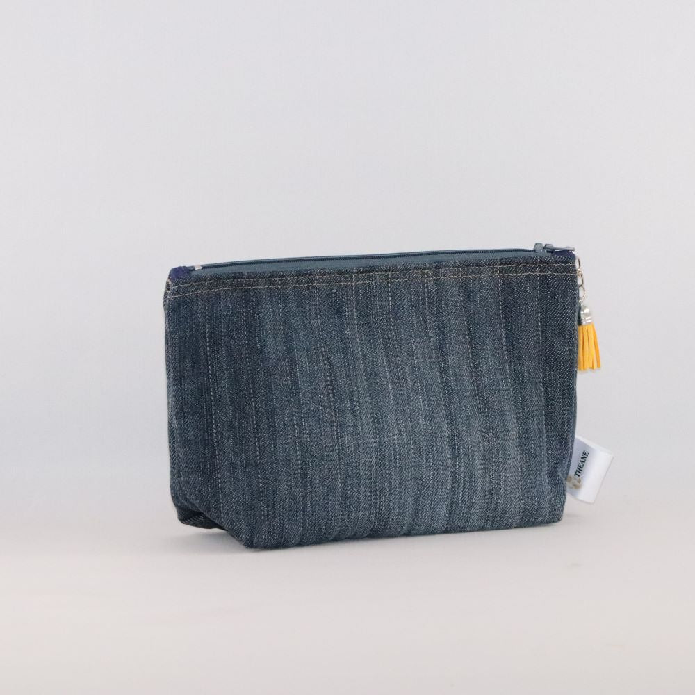 trousse triangle en jean matelassé un côté