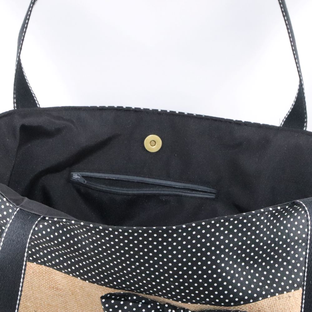 cabas toile de jute upcyclée avec noeud noir à pois détail intérieur