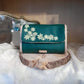 Mini sac vert émeraude broderie florale ivoire côtés bois loupe frêne