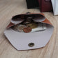porte-monnaie origami garni de pièces